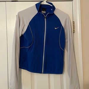 Nike zip up running jacket. Blue with gray sleeves